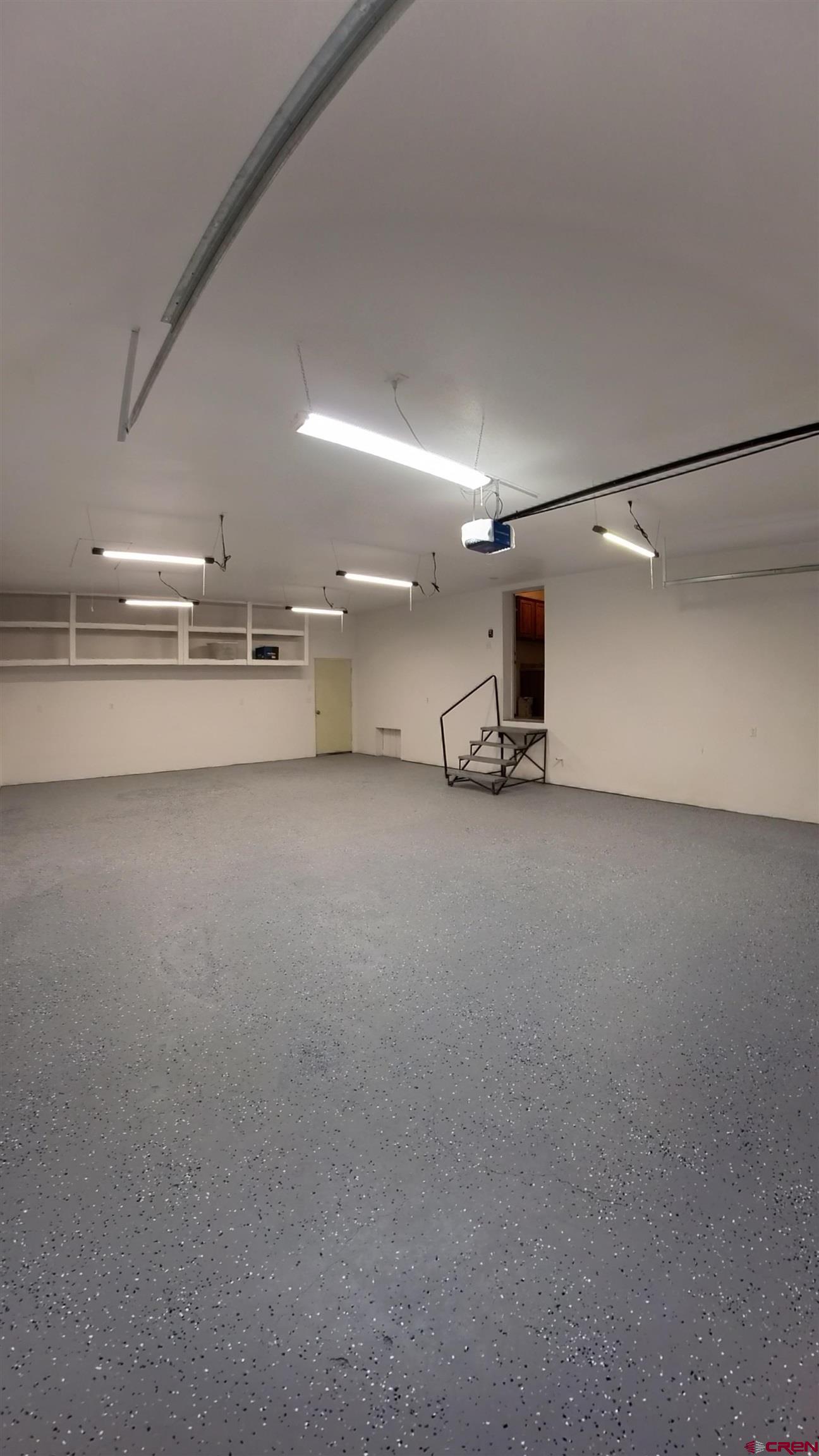 16875 Ember Road Cedaredge, CO 81413 - Photo 6 of 31 a view of a room with gym equipment