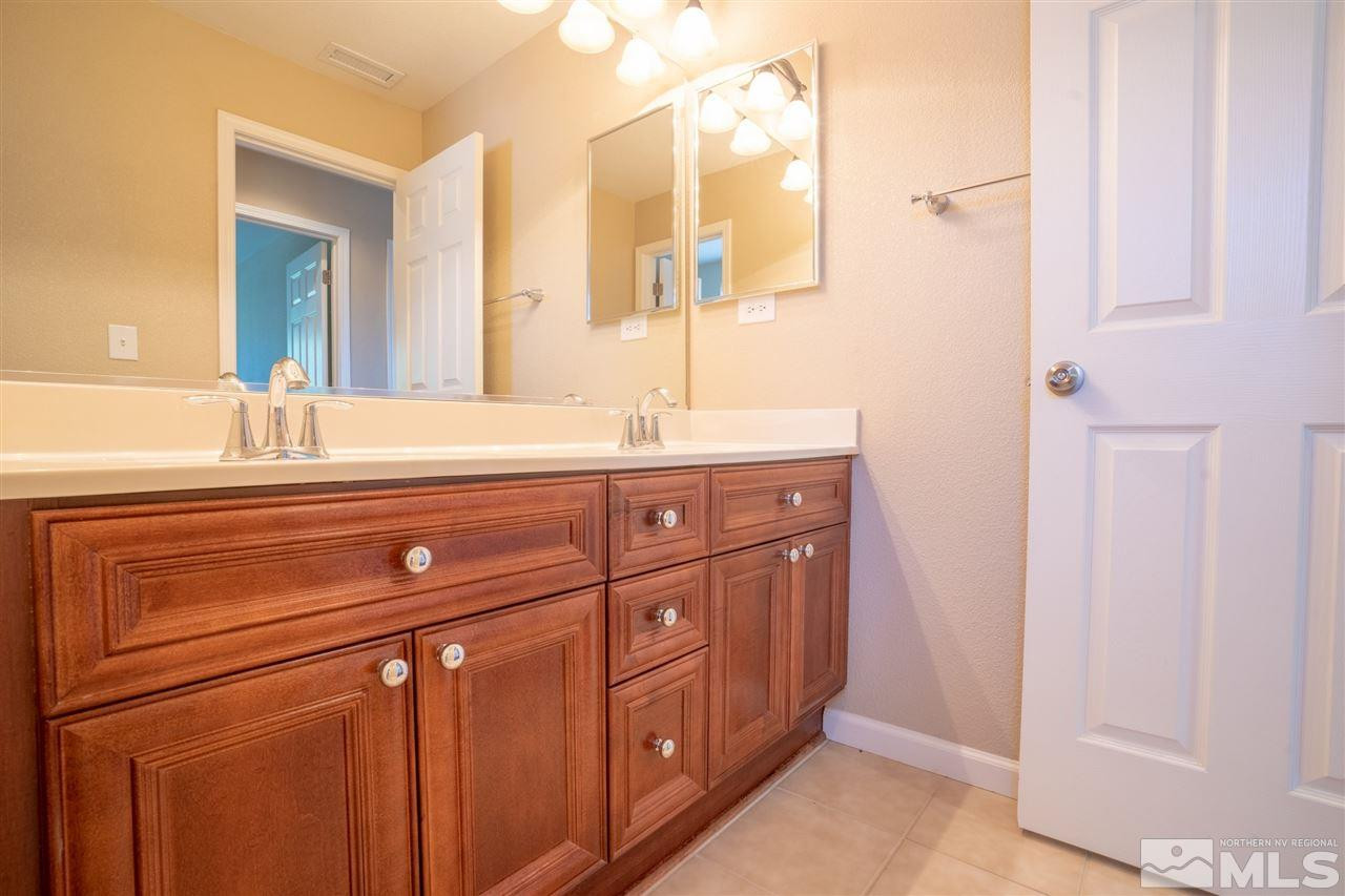 1975 Long Reno, NV 89521 - Photo 17 of 23 a spacious bathroom with a sink and a mirror