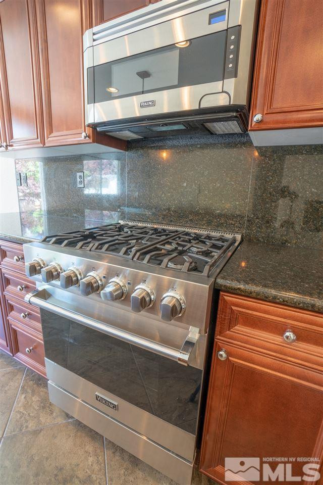 1975 Long Reno, NV 89521 - Photo 10 of 23 a stove top oven sitting inside of a kitchen