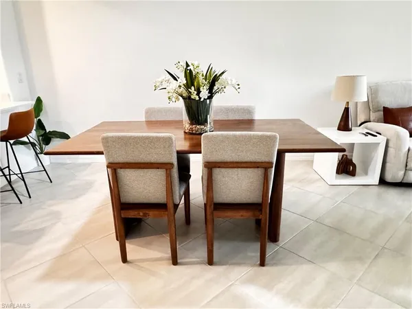 a view of a dining room with furniture