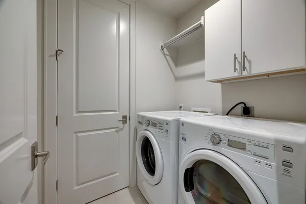 a view of kitchen with washer and dryer