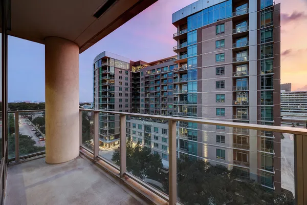 a view of building with glass door