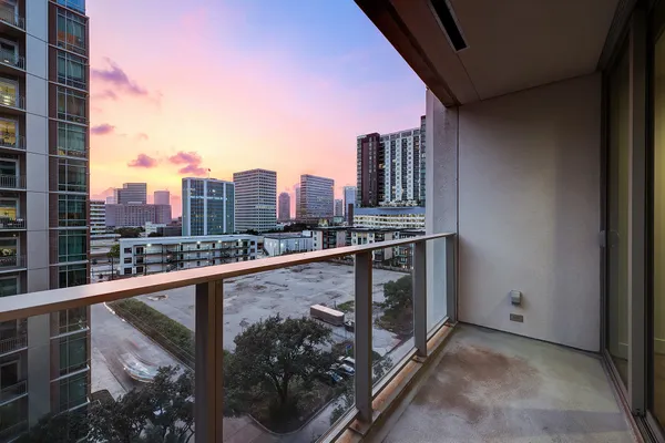 a view of balcony with city
