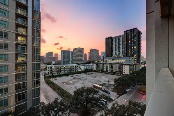a view of a balcony with city view