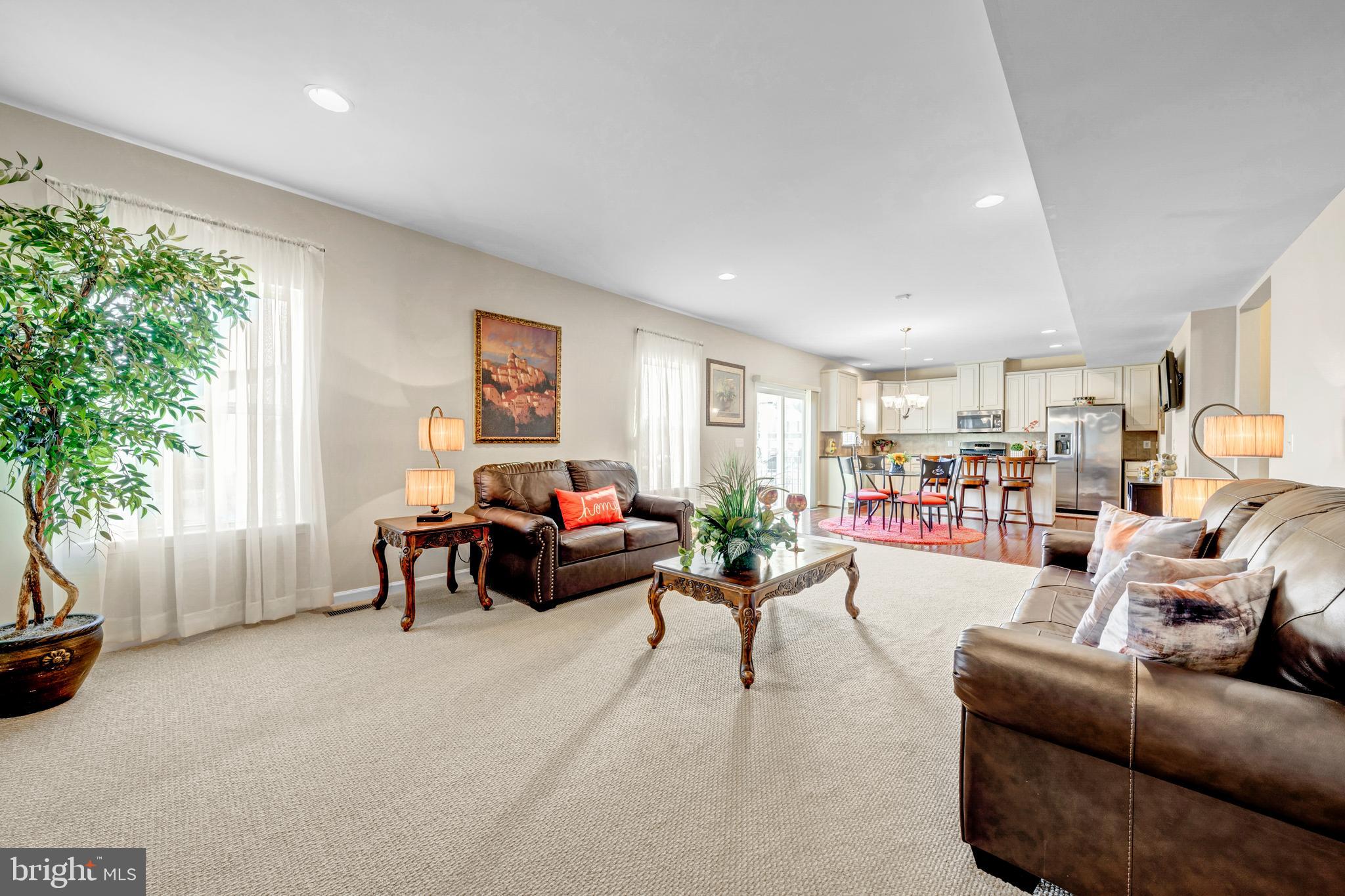 7137 Shepherdstown Road Warrenton, VA 20187 - Photo 14 of 60 a living room with furniture and a large window