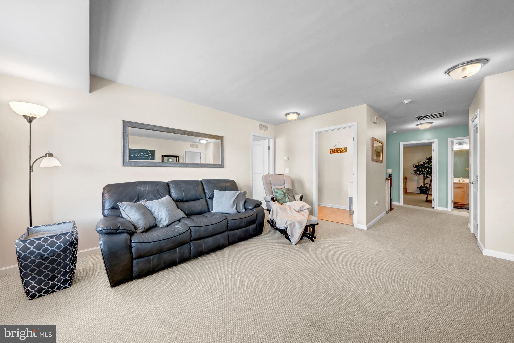 7137 Shepherdstown Road Warrenton, VA 20187 - Photo 26 of 60 a living room with furniture and a window