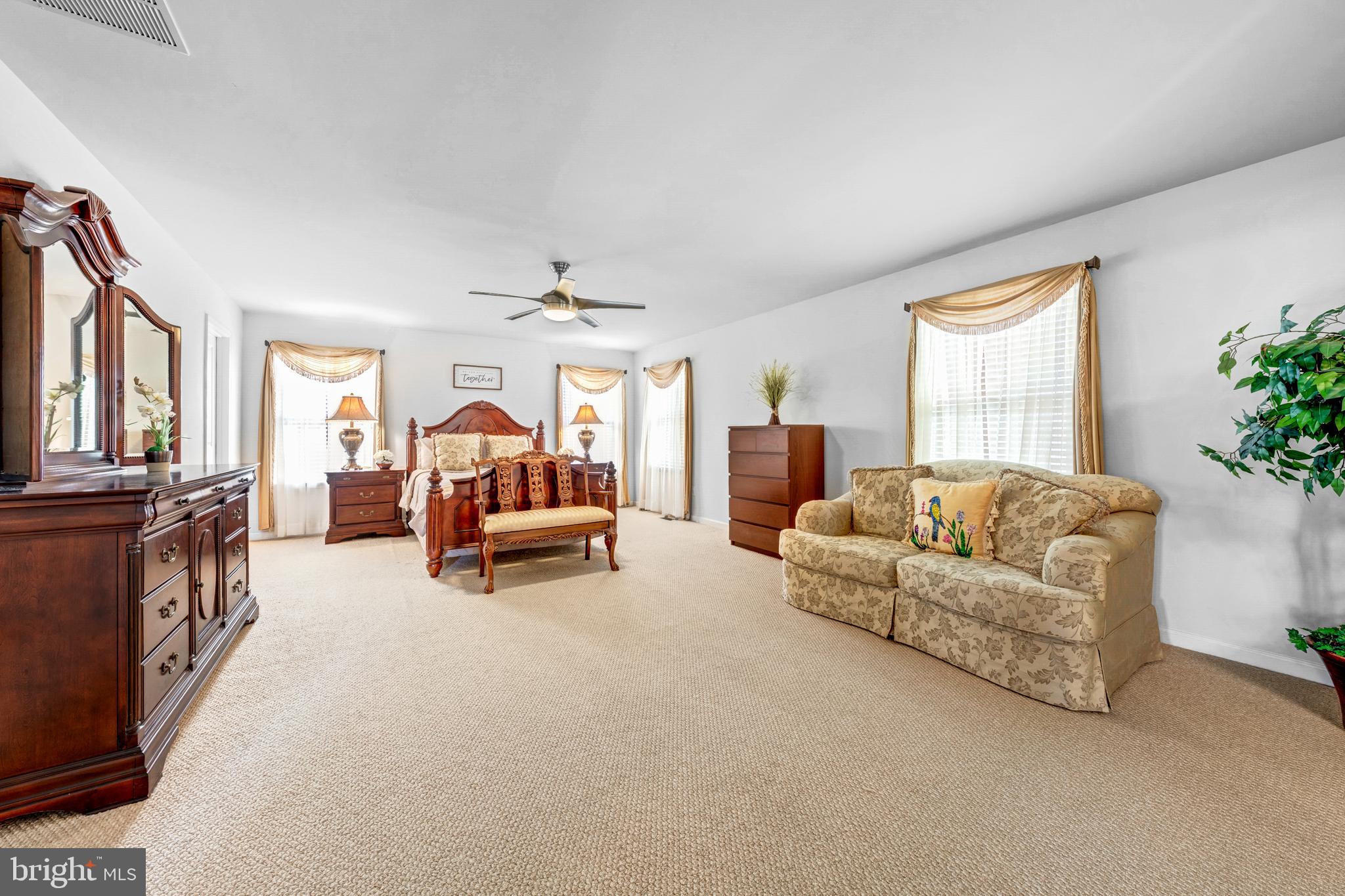 7137 Shepherdstown Road Warrenton, VA 20187 - Photo 28 of 60 a living room with furniture and a large window