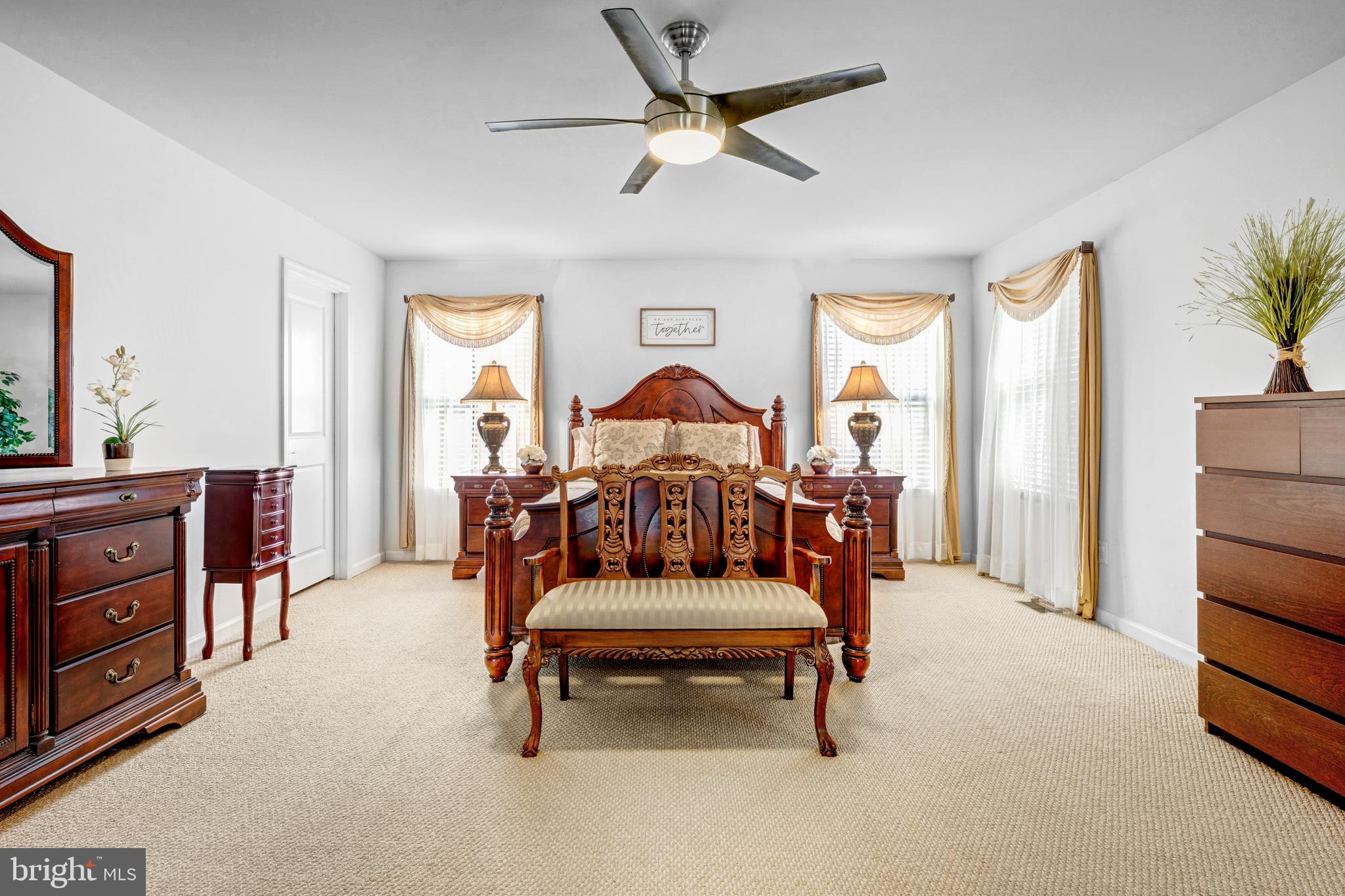 7137 Shepherdstown Road Warrenton, VA 20187 - Photo 29 of 60 a living room with furniture and a chandelier