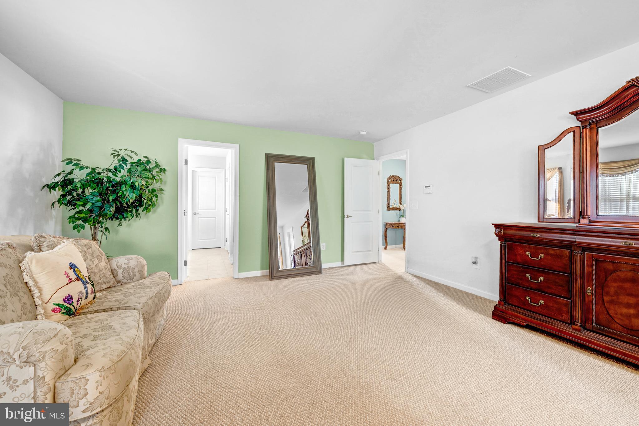 7137 Shepherdstown Road Warrenton, VA 20187 - Photo 30 of 60 a bedroom with a bed and a dresser