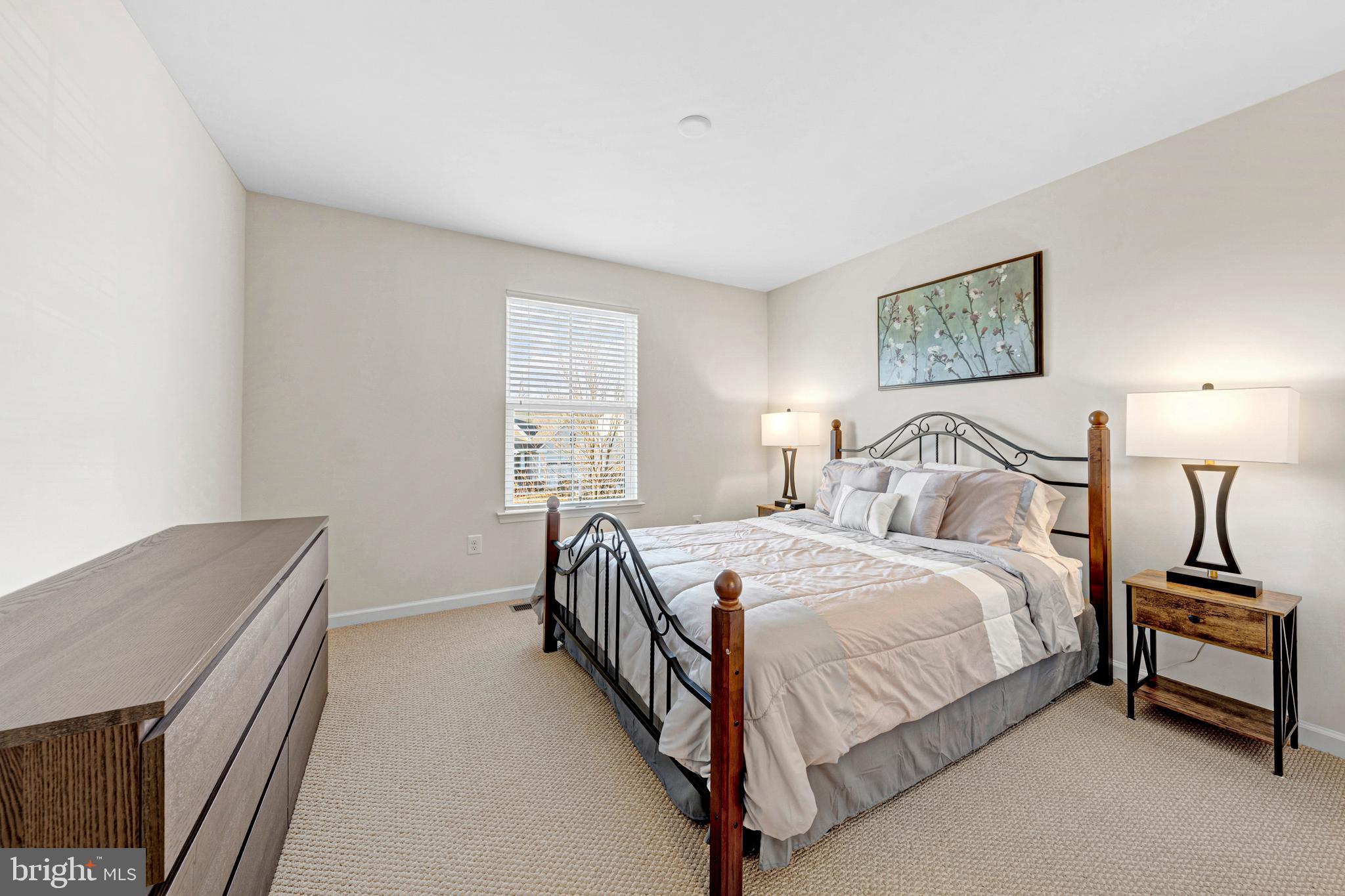 7137 Shepherdstown Road Warrenton, VA 20187 - Photo 33 of 60 a bedroom with a bed and a window