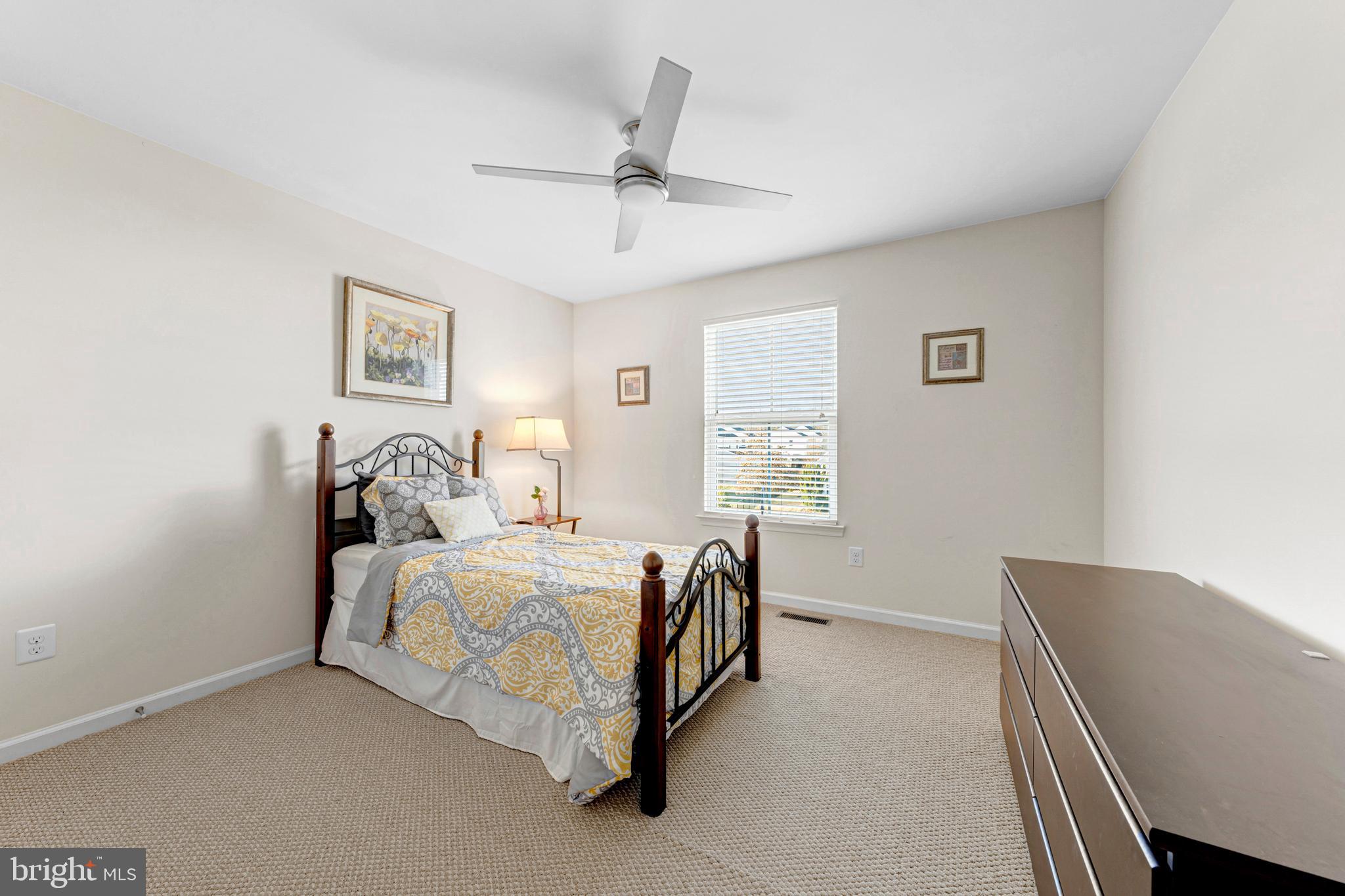 7137 Shepherdstown Road Warrenton, VA 20187 - Photo 38 of 60 a bedroom with a bed and a window