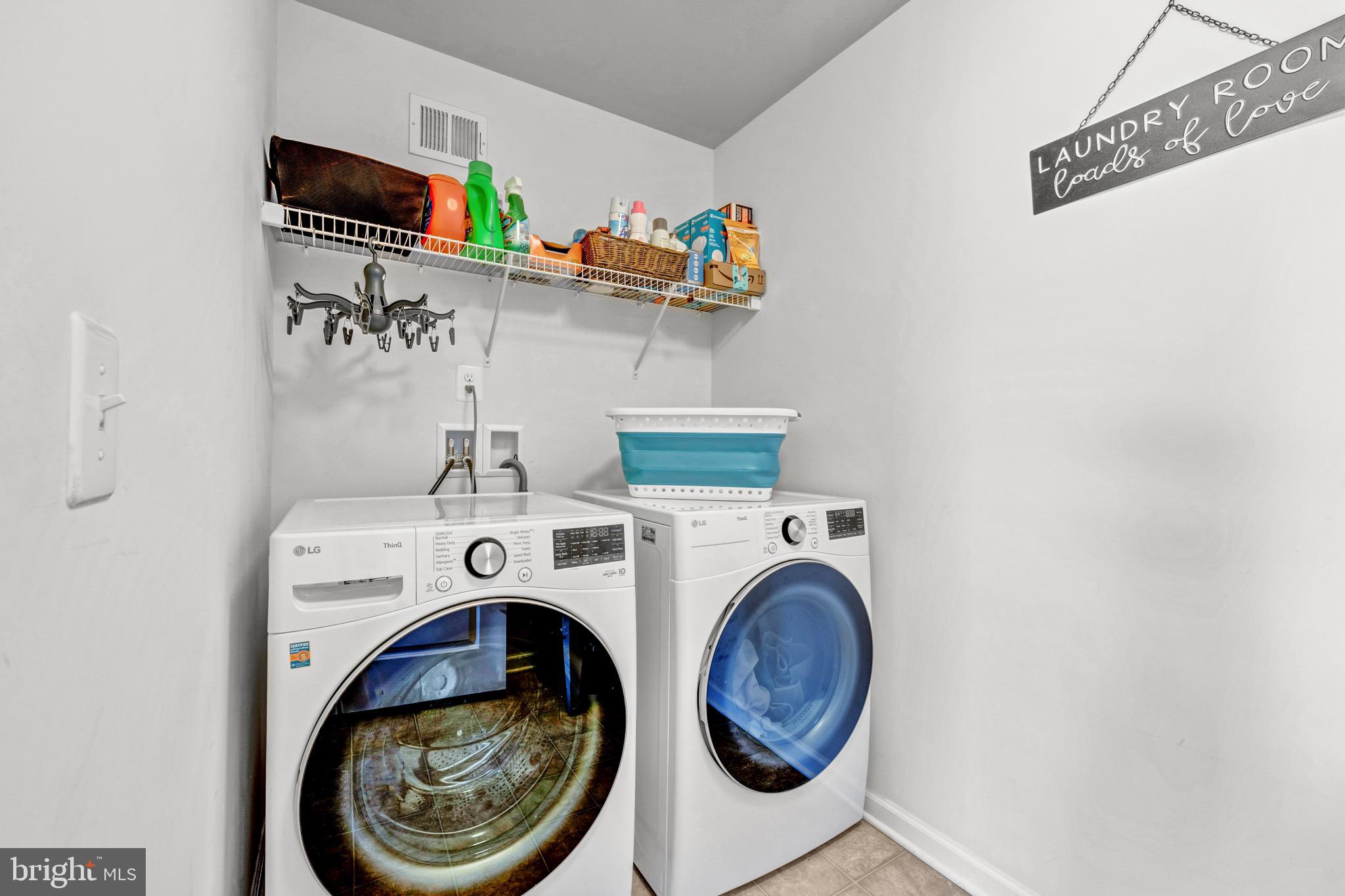 7137 Shepherdstown Road Warrenton, VA 20187 - Photo 39 of 60 a utility room with dryer and washer
