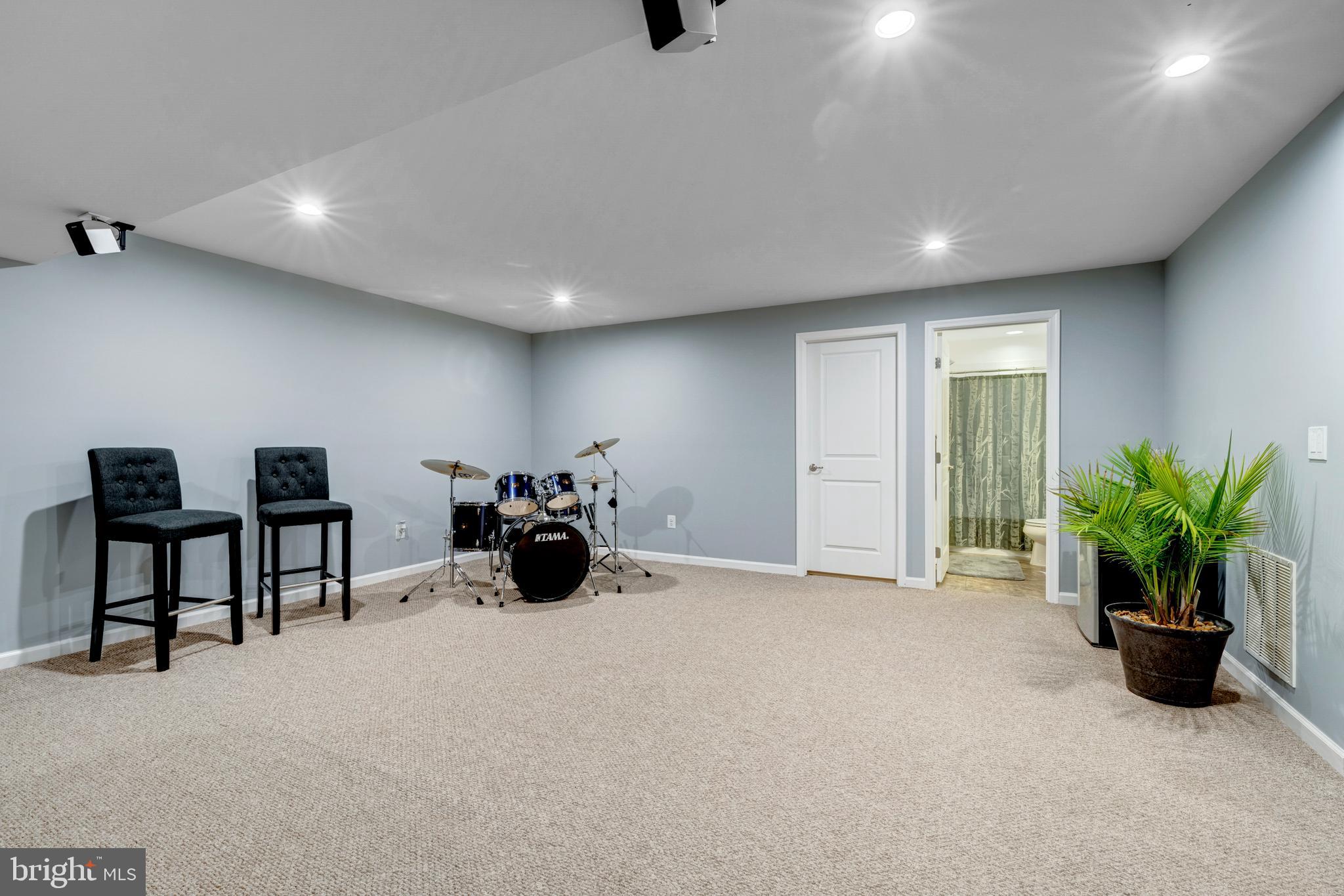 7137 Shepherdstown Road Warrenton, VA 20187 - Photo 43 of 60 a view of a livingroom with furniture and a potted plant
