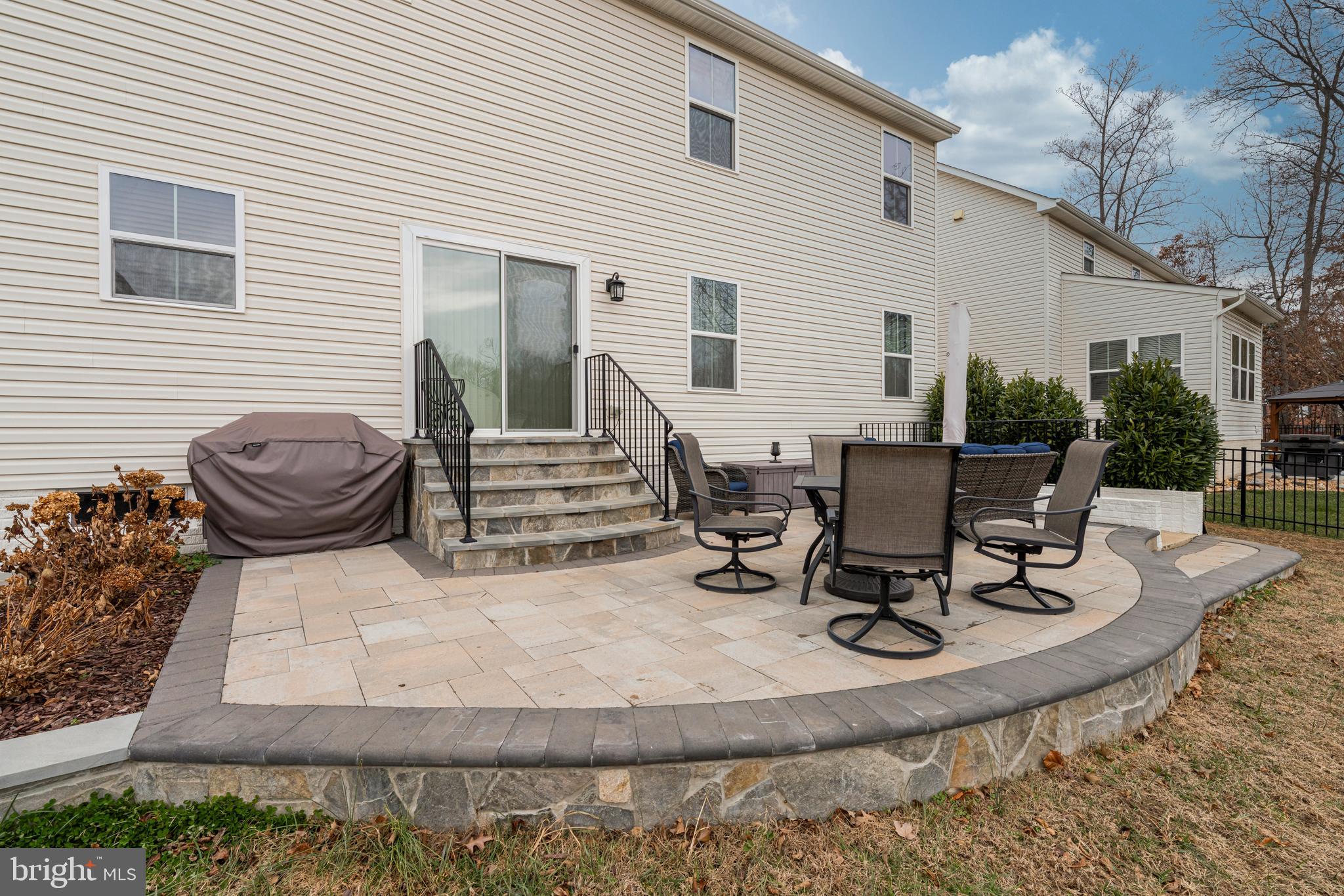 7137 Shepherdstown Road Warrenton, VA 20187 - Photo 49 of 60 a view of a white house with outdoor seating