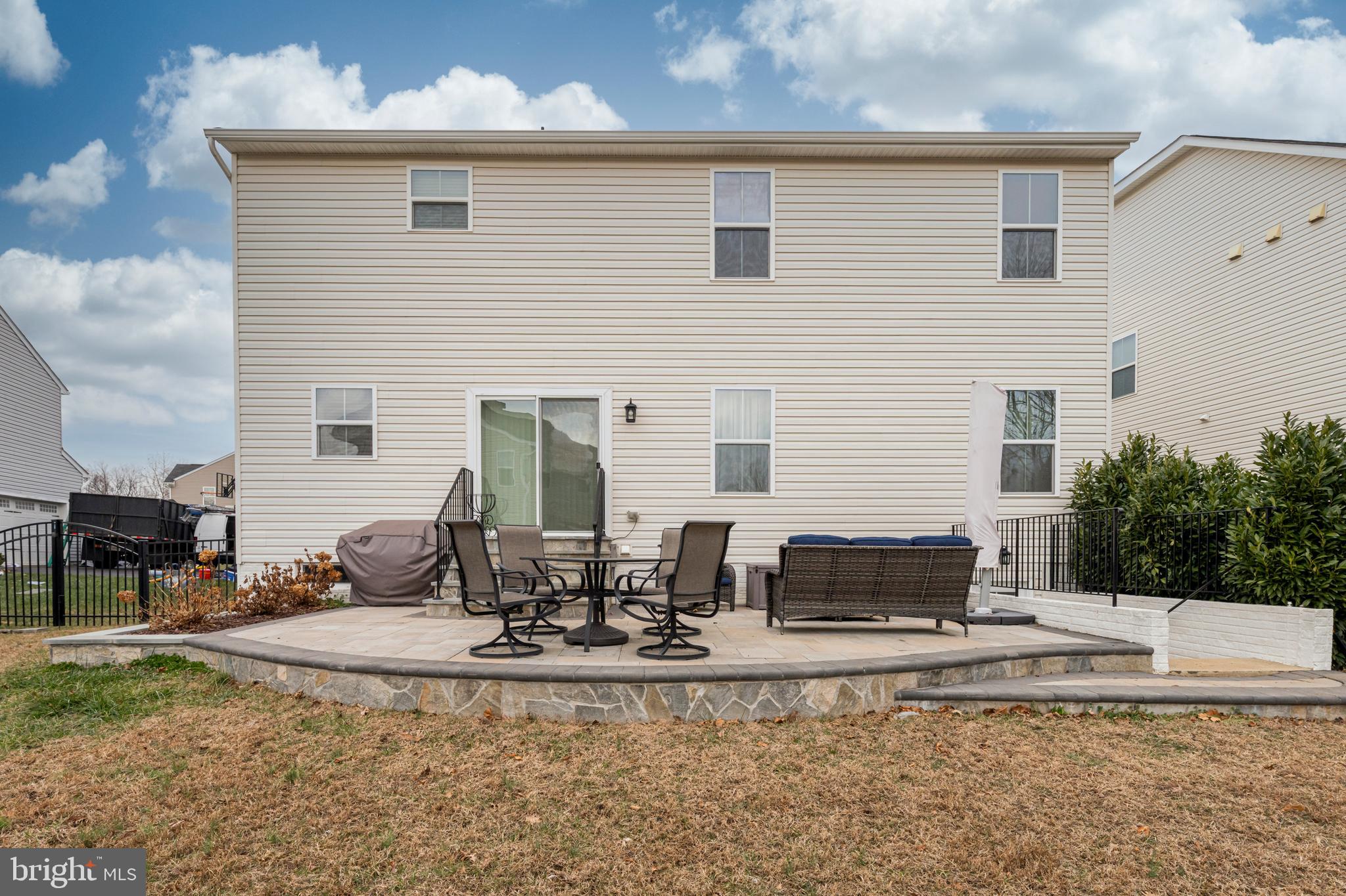 7137 Shepherdstown Road Warrenton, VA 20187 - Photo 50 of 60 a view of a dinning table and chairs in the patio