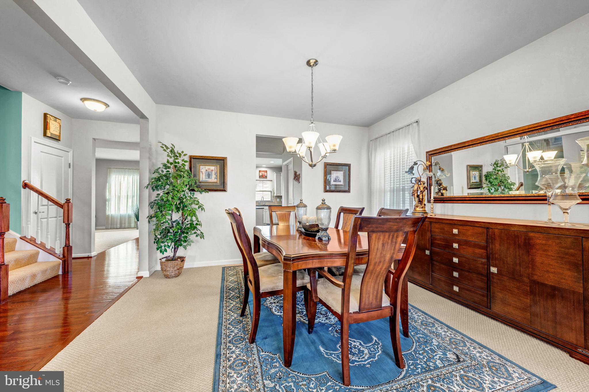 7137 Shepherdstown Road Warrenton, VA 20187 - Photo 7 of 60 a view of a dining room with furniture window and wooden floor