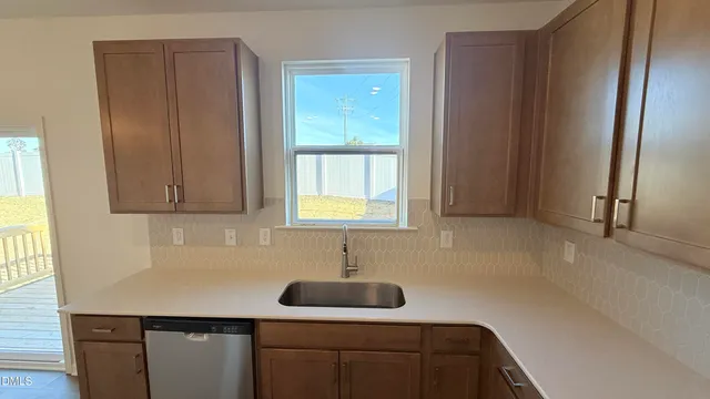 a bathroom with a double vanity sink and mirror