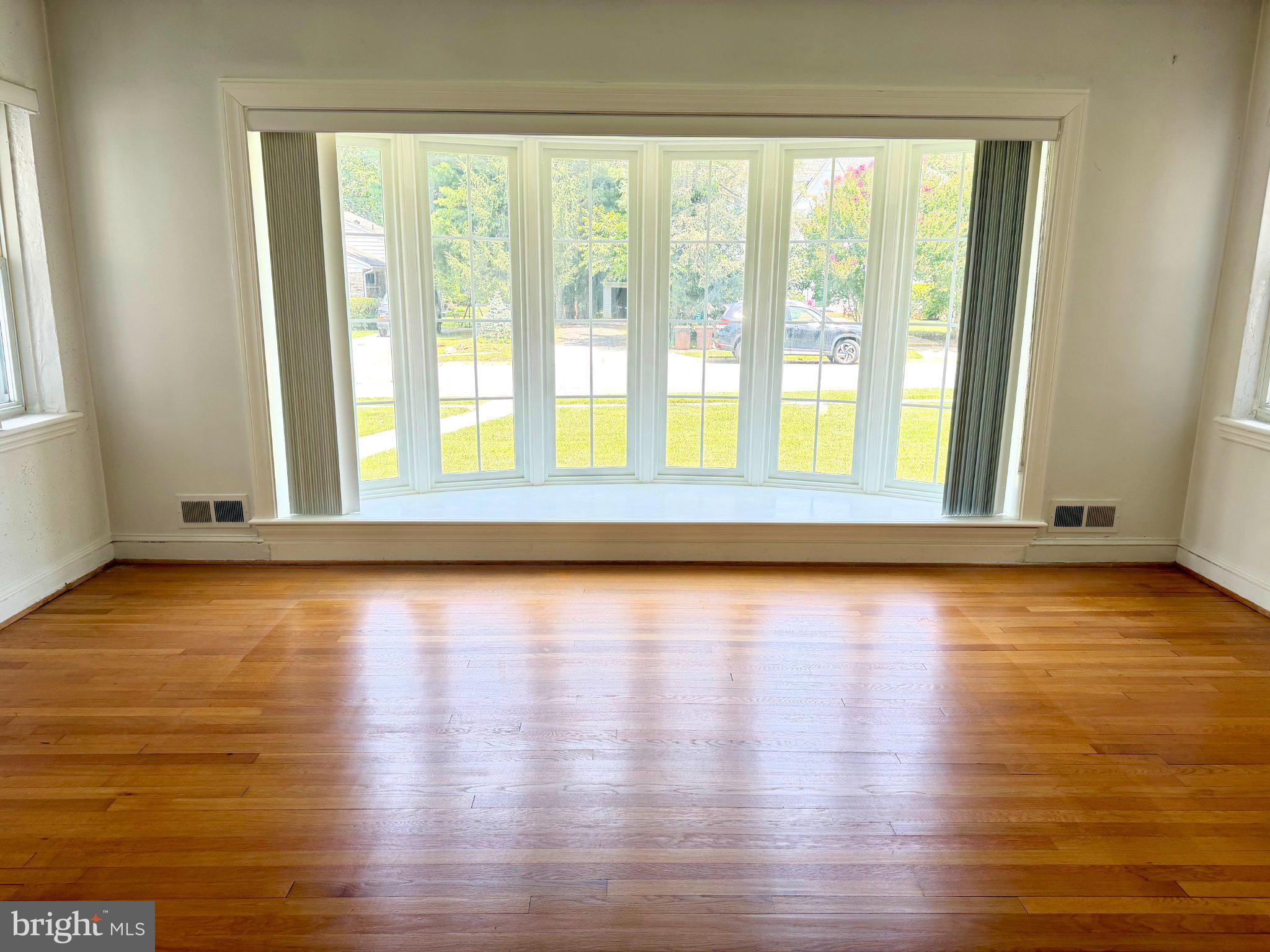 6318 Winner Avenue Baltimore, MD 21215 - Photo 10 of 75 a view of room with window and wooden floor