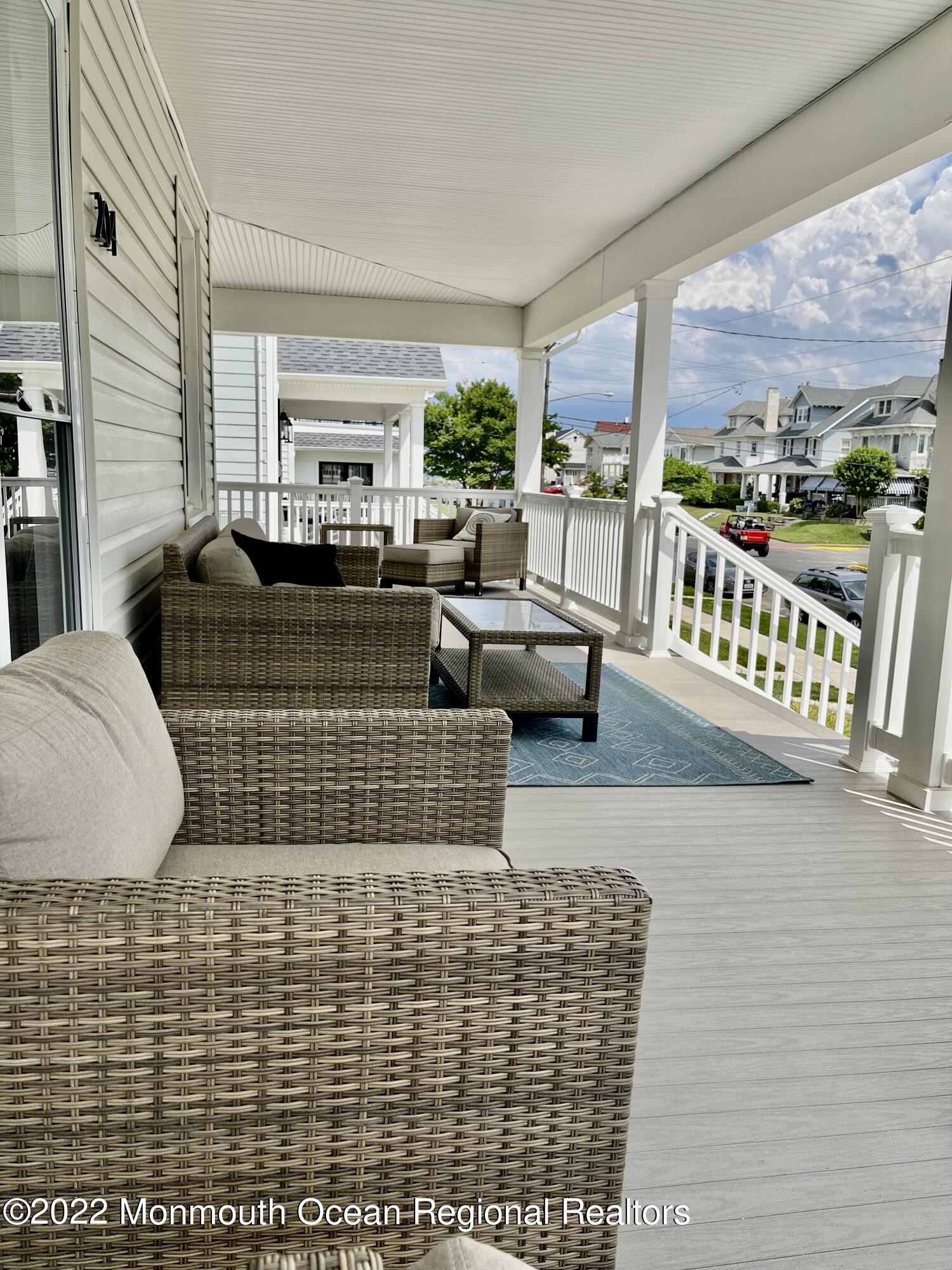 204 4th Avenue Bradley Beach, NJ 07720 - Photo 3 of 24 a living room with furniture
