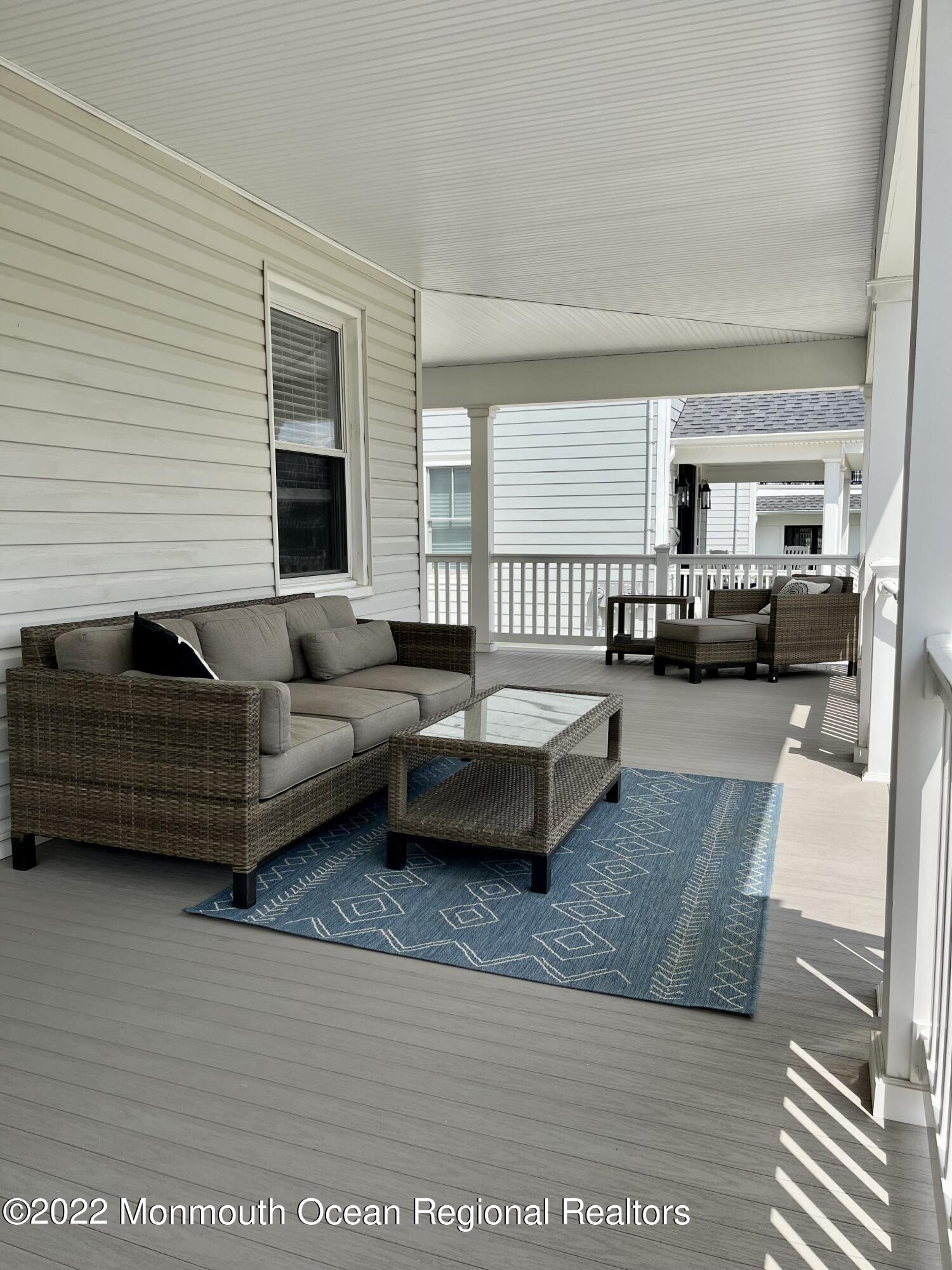 204 4th Avenue Bradley Beach, NJ 07720 - Photo 4 of 24 a living room with furniture and a couch