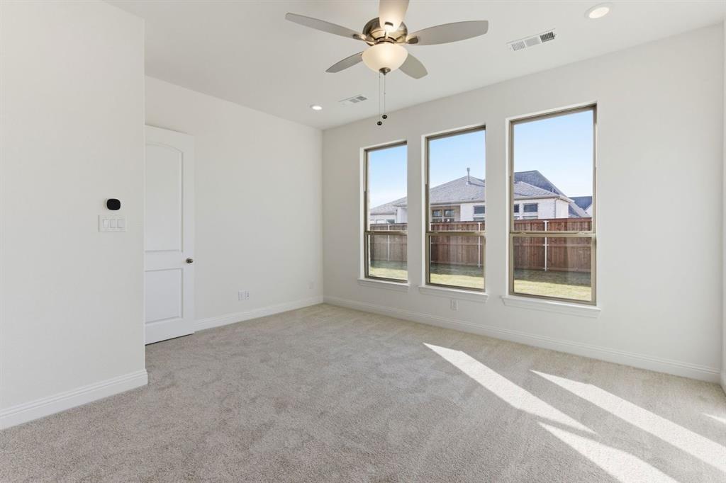 241 Bay Laurel Road McKinney, TX 75071 - Photo 22 of 32 a view of an empty room with a window