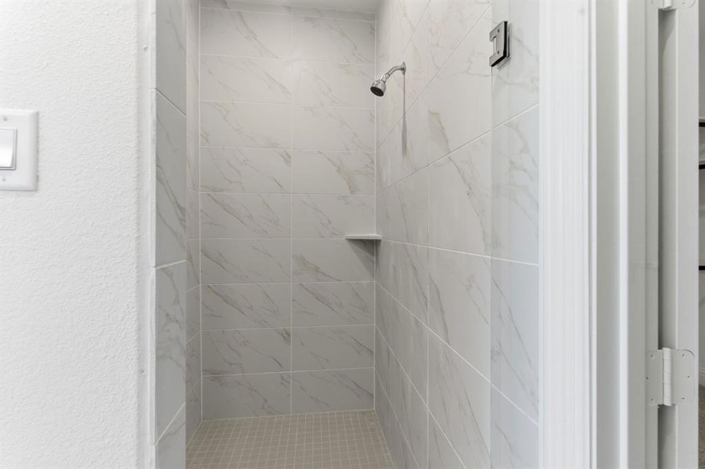 241 Bay Laurel Road McKinney, TX 75071 - Photo 29 of 32 a close up of a shower
