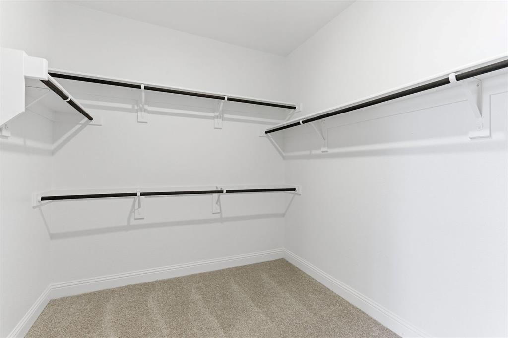 241 Bay Laurel Road McKinney, TX 75071 - Photo 31 of 32 a view of an empty walk in closet