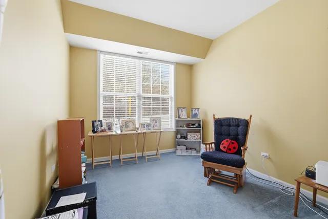 a room with furniture and a window