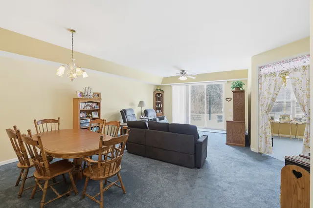 a view of a livingroom with furniture and window