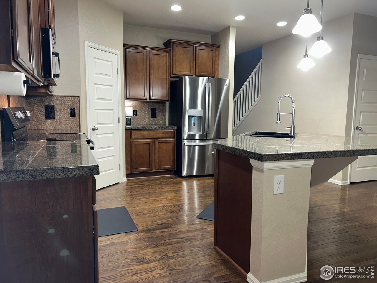 5543 Calgary Street Timnath, CO 80547 - Photo 11 of 48 Kitchen with Brand New Appliances