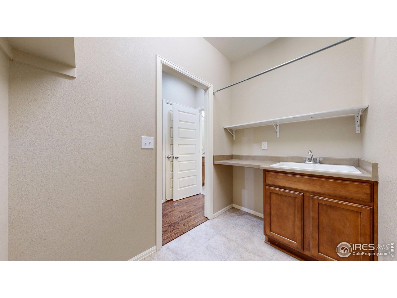 5543 Calgary Street Timnath, CO 80547 - Photo 16 of 48 Main Floor Laundry