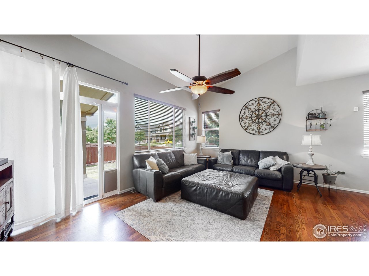 5543 Calgary Street Timnath, CO 80547 - Photo 2 of 48 Cozy Living Room (Photo Taken in 2022)