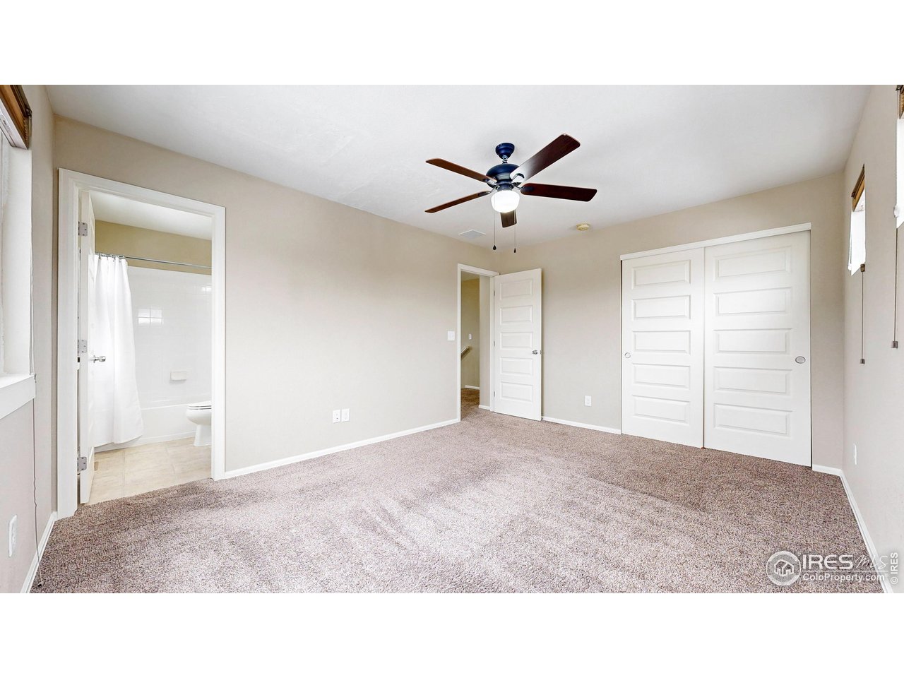 5543 Calgary Street Timnath, CO 80547 - Photo 23 of 48 Bedroom with private bathroom