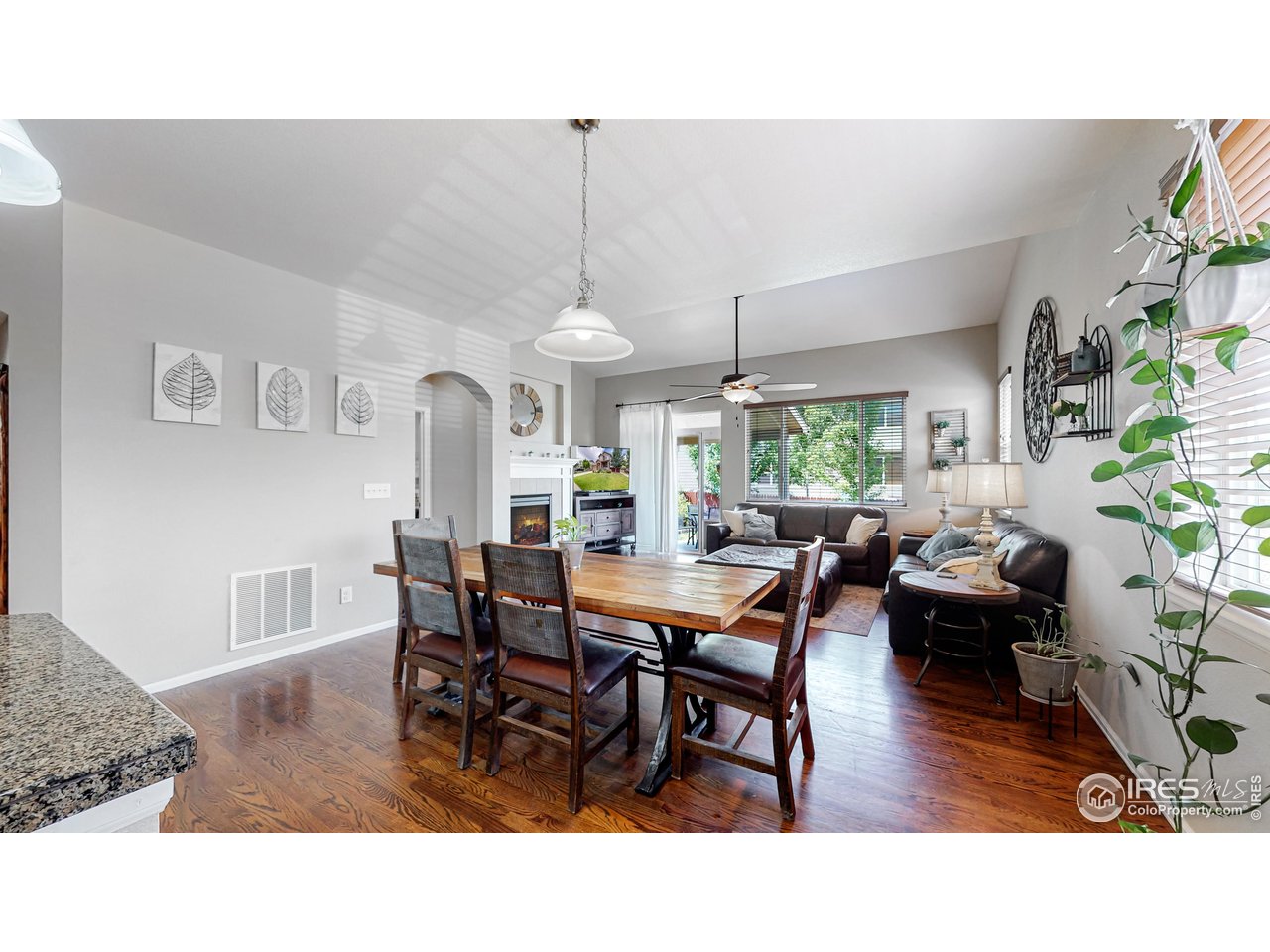 5543 Calgary Street Timnath, CO 80547 - Photo 7 of 48 Dining and Living Rooms (Photo Taken in 2022)
