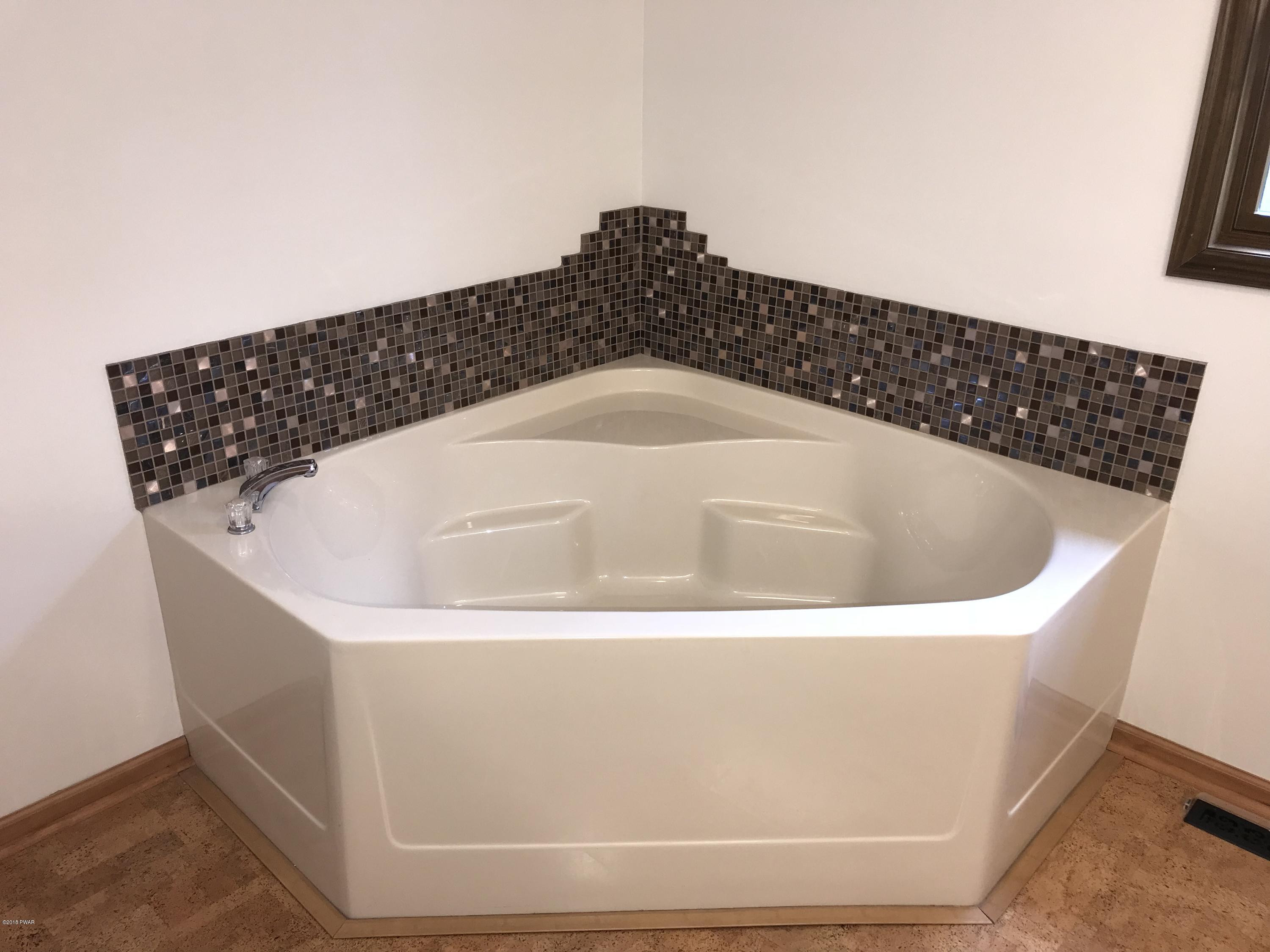232 Maple Ridge Drive Hawley, PA 18428 - Photo 18 of 44 a close view of a sink in a bathroom