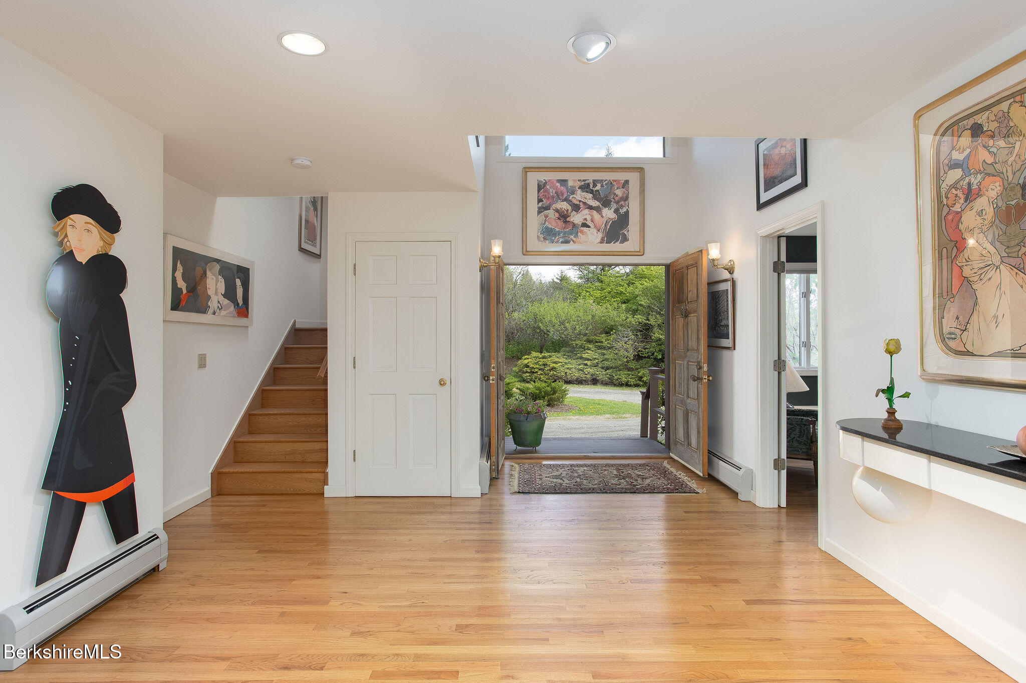 77 Hurlburt Road Great Barrington, MA 01230 - Photo 9 of 48 a view of an entryway with wooden floor and a livingroom view