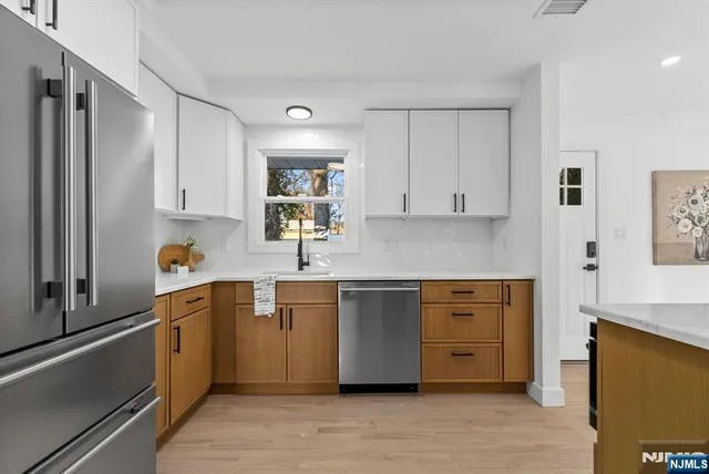 a living room with furniture and a lamp