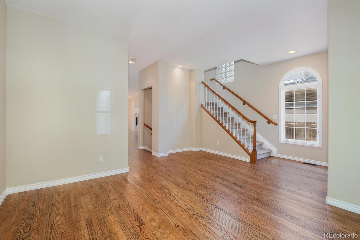 210 Cook Street Denver, CO 80206 - Photo 3 of 26 a view of entryway with wooden floor