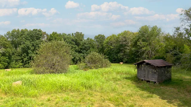 a view of a lake with a yard