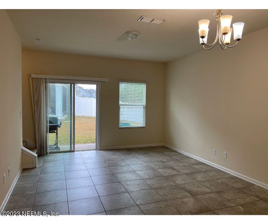 343 Servia Drive St. Johns, FL 32259 - Photo 2 of 8 a view of an empty room and window