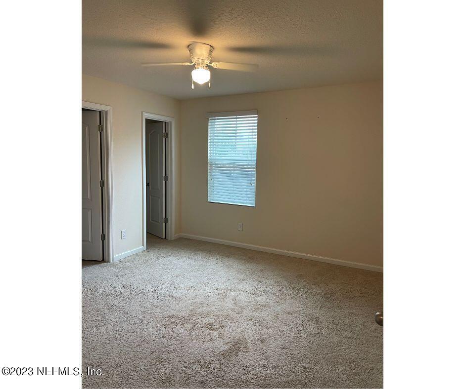 343 Servia Drive St. Johns, FL 32259 - Photo 6 of 8 a view of an empty room with a window