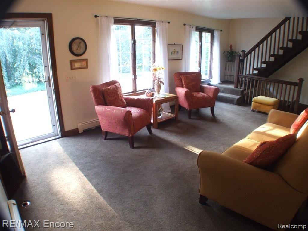 8550 Allen Road Clarkston, MI 48348 - Photo 4 of 26 Natural light floods living room