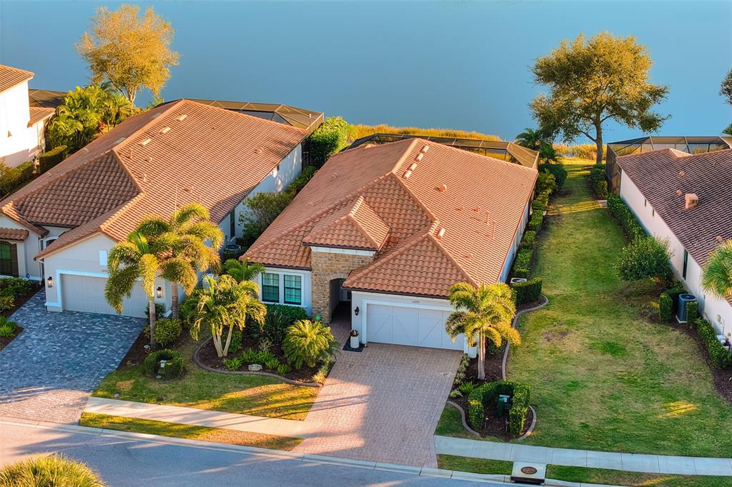 12729 Del Corso Loop Bradenton, FL 34211 - Photo 1 of 65