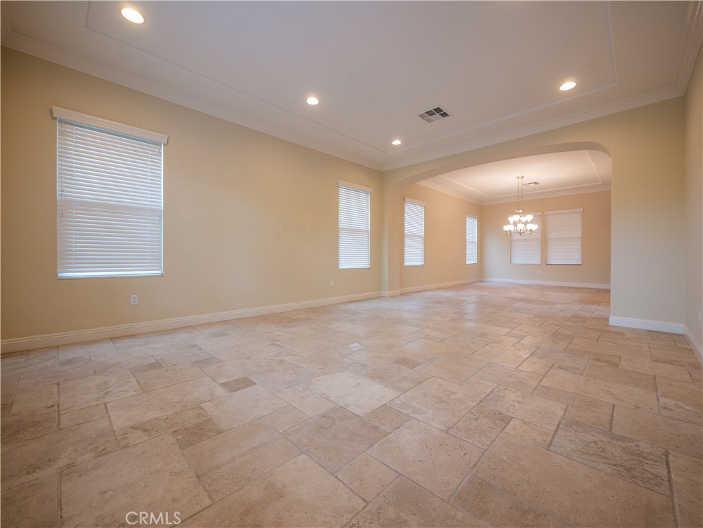 8111 Sunset Rose Drive Corona, CA 92883 - Photo 3 of 19 a view of a livingroom with a staircase
