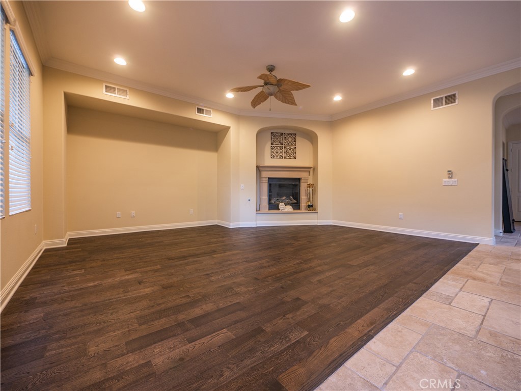 8111 Sunset Rose Drive Corona, CA 92883 - Photo 7 of 19 a view of empty room with wooden floor