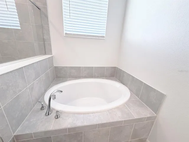 a bathroom with a bathtub