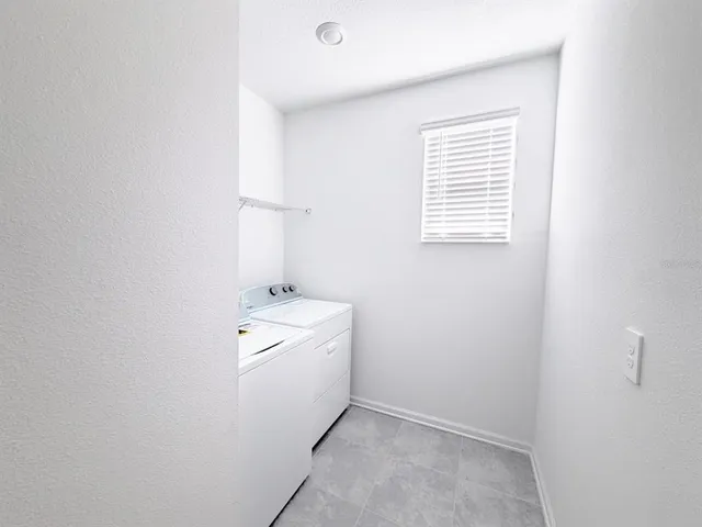 a room with a washer and dryer