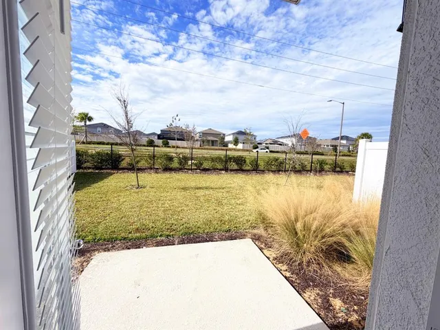 a view of a swimming pool with a lake view