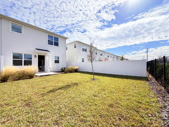 a swimming pool with an outdoor space