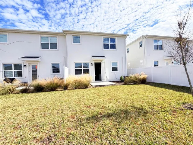 a house view with a garden space